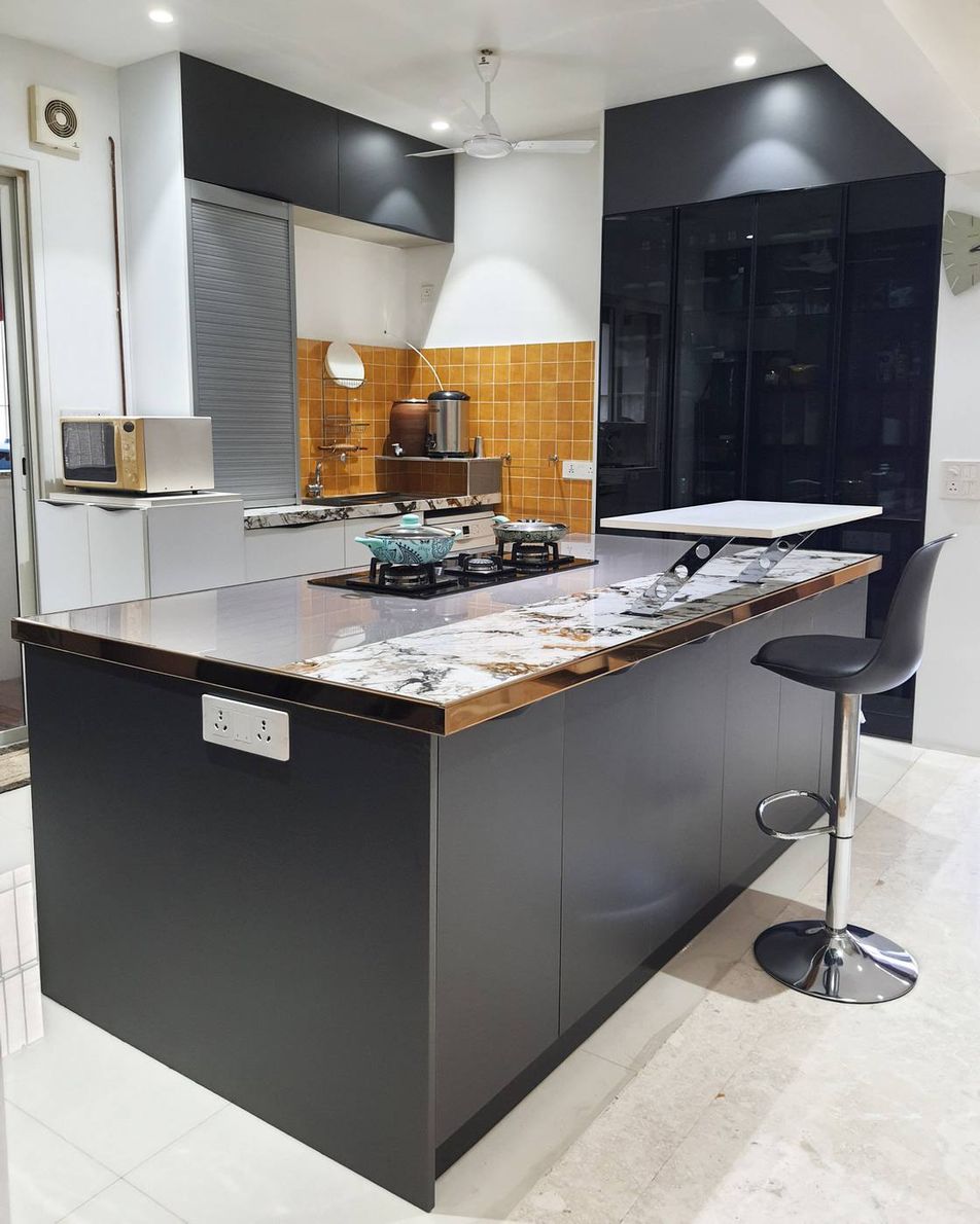 The Kogta House - working kitchen with ochre tile backsplash